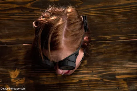 Charlie Ann: Redhead in Glasses Endures BDSM Ass Whipping in Pillory – photo 10 of 17