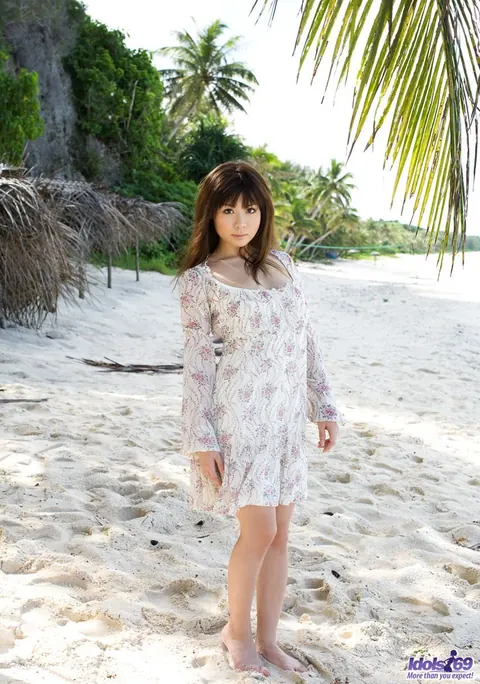 Aya Hirai: Busty Japanese MILF Strips Out of Her Bikini on the Beach – photo 1 of 16