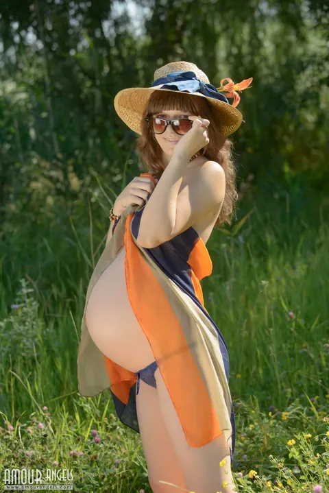 Red Eva: Pregnant Redhead Flashes Her Body Outdoors – photo 2 of 20