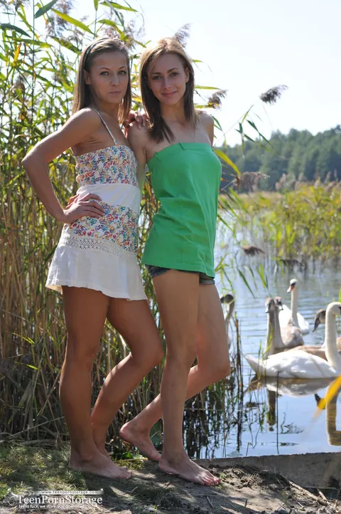 Two Slim Women Strip Skirts and Eat Pussy on a Dock – photo 1 of 20