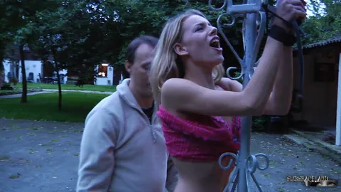 Bound Woman Spreads Her Legs Outdoors on a Cross – photo 3 of 17