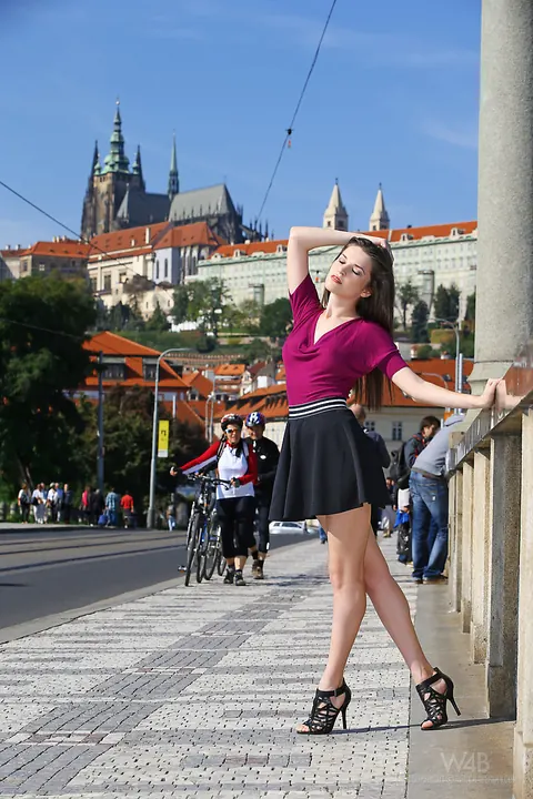 Serena Wood: Slim Brunette Shows Her Legs in a Miniskirt and Heels Outdoors – photo 8 of 16