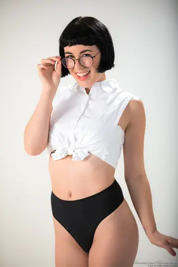 Short-Haired Brunette Removes Glasses and Poses Naked