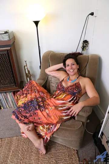 Busty Mature Brunette Undresses and Spreads Wide