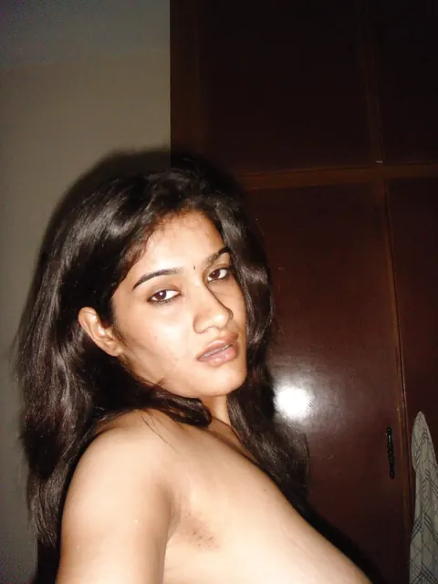 Indian Woman Sucks Her Big Natural Tits and Spreads – photo 5 of 10