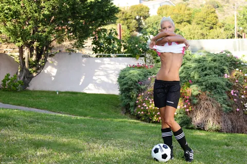 Franziska Facella: Skinny Blonde Poses with a Soccer Ball in Shorts Outdoors – photo 7 of 16