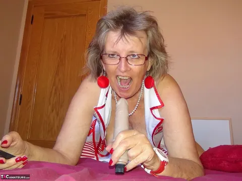 Mature Nurse in Glasses Frees Her Tits and Rides a Dildo – photo 6 of 20