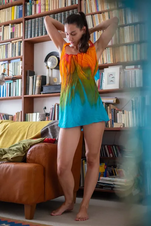 Slim Short-Haired Woman with Glasses Poses Nude at the Library – photo 17 of 17