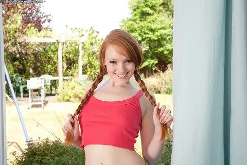 Kloe Kane: Amateur Redhead in Pigtails and Socks Spreads Outdoors – photo 1 of 16