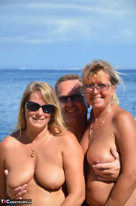 Sweet Susi: Two Curvy MILFs in Glasses Share a Man in a Threesome on the Beach – photo 1 of 20