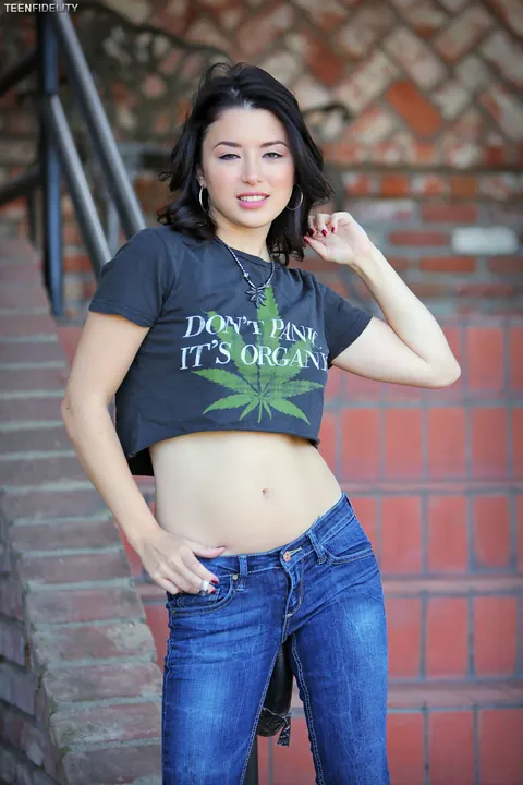 Daisy Haze: Asian Brunette Sucks Lollipop and Spreads Her Shaved Pussy Outdoors – photo 3 of 17