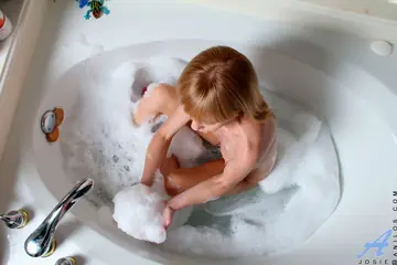 Busty Redhead MILF Toys Her Trimmed Pussy and Gets Fucked in the Bathroom