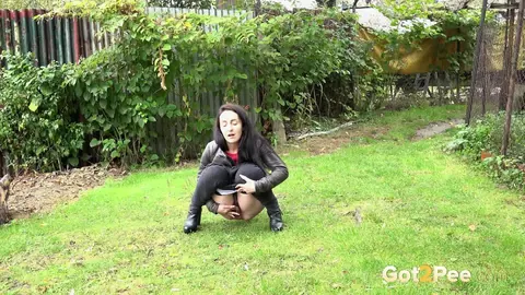 Di Devi: European Brunette Pulls Her Jeans Down and Pees on the Grass – photo 11 of 15