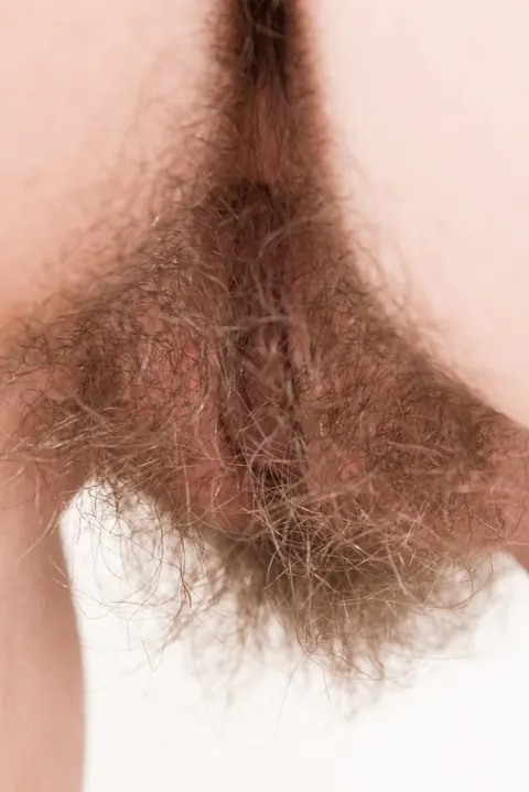 Hairy Brunette Fingers and Spreads Her Pussy – photo 16 of 16