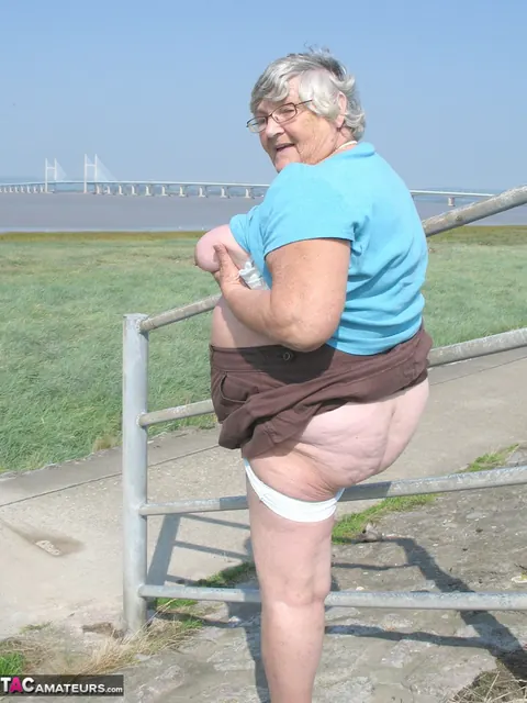 BBW Blonde Poses Nude on a Bike Path – photo 8 of 20