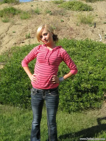 Blonde in Jeans and Panties Poses Outdoors