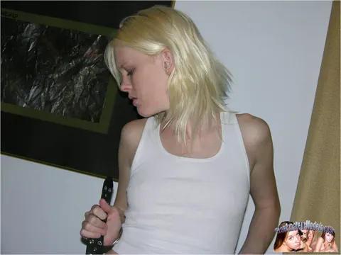 Ember Skye: Skinny Blonde Strips Out of Her Boots and Spreads on the Sofa – photo 6 of 15