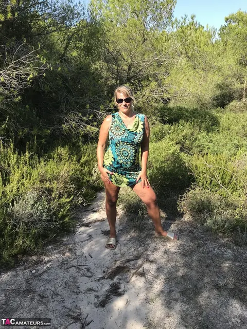 Sweet Susi: Curvy Blonde MILF Strips Out of Her Dress and Bikini Outdoors – photo 1 of 20