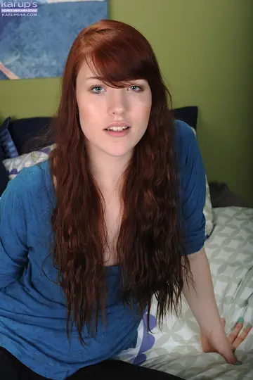 Busty Redhead Strips Out of Her Yoga Pants and Spreads Her Pussy