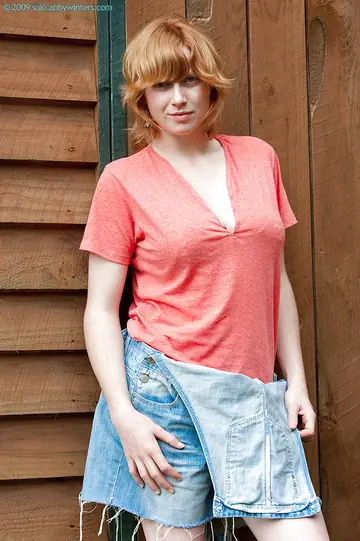 Busty Redhead Undresses Outdoors and Spreads Her Hairy Pussy