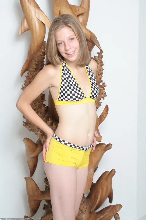 Chastity Lynn: Petite Blonde Strips Out of Her Bikini and Boots – photo 6 of 20