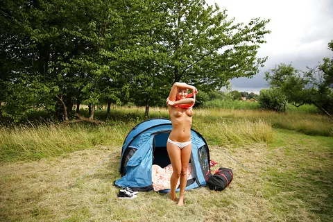 Woman Lifts Her Skirt and Pulls Her Panties Aside Outdoors – photo 9 of 16