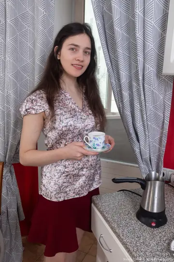 Brunette Amateur Strips Out of Her Skirt and Spreads Her Hairy Pussy