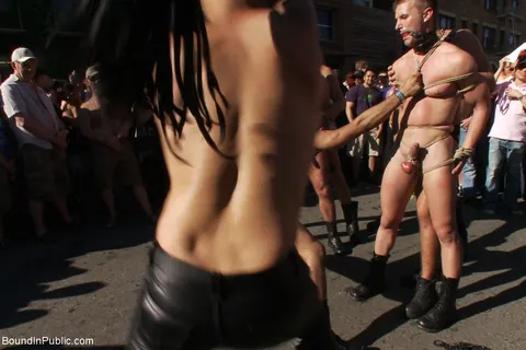 Two Men Bound and Naked in a Public Outdoor Setting – photo 14 of 21