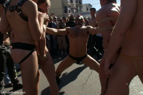 Two Men Bound and Naked in a Public Outdoor Setting – photo 9 of 21