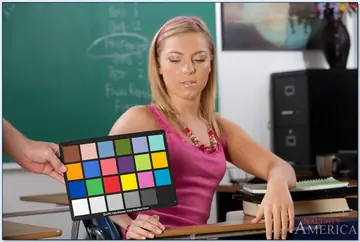 Petite Blonde in a Skirt and Glasses Strips and Spreads Her Pussy