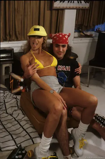 Blonde in Shorts Sucks Two Men and Takes Anal