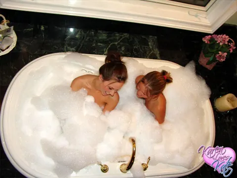 Two Busty Lesbians with Big Asses Fondle in the Bubble Bath – photo 6 of 12