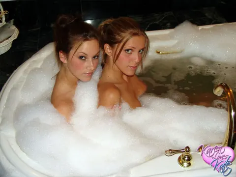 Two Busty Lesbians with Big Asses Fondle in the Bubble Bath – photo 11 of 12