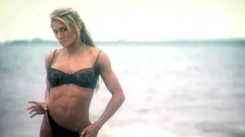 Abby Marie: Blonde MILF in Lingerie Poses and Strips on the Beach – photo 9 of 21