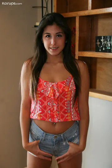 Brunette Strips Out of Her Shorts and Spreads Wide