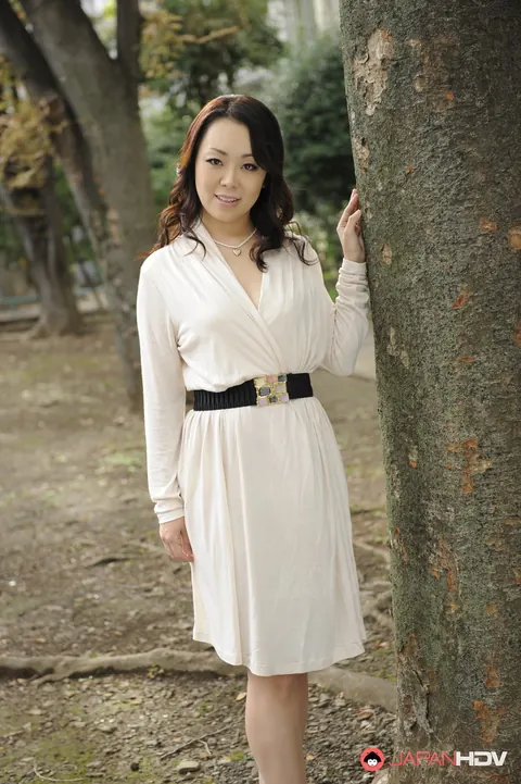 Yuna Yamami: Japanese Brunette Poses in a White Dress and Heels Outdoors – photo 1 of 15