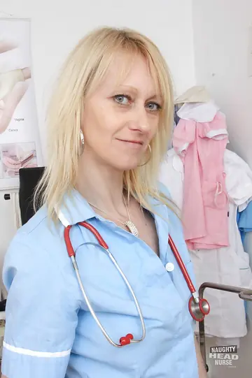 Mature Blonde Nurse Shows Her Shaved Pussy in Stockings