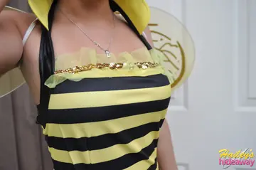 Slim Brunette Strips Off Her Costume and Skirt to Show Her Ass