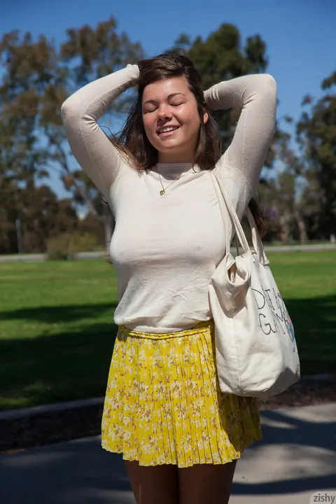 Nikki Yann: Busty Brunette Flashes Skirt and Teases Her Tits Outdoors – photo 11 of 11