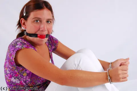 Redhead in Pigtails Handcuffed and Ball-Gagged – photo 12 of 16