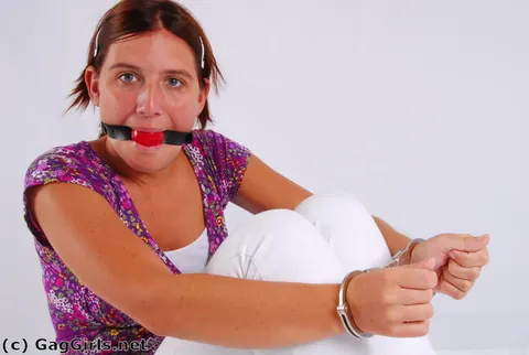 Redhead in Pigtails Handcuffed and Ball-Gagged – photo 13 of 16