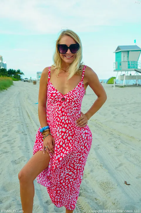 Slim Blonde MILF Strips Naked and Uses a Toy on a Public Beach – photo 3 of 15