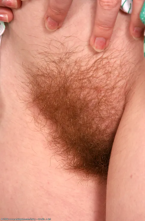 Short-Haired Hairy Woman in Glasses Poses Clothed – photo 5 of 21