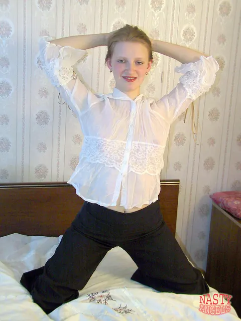 European Brunette Shows Her Hairy Pussy on the Bed – photo 3 of 21