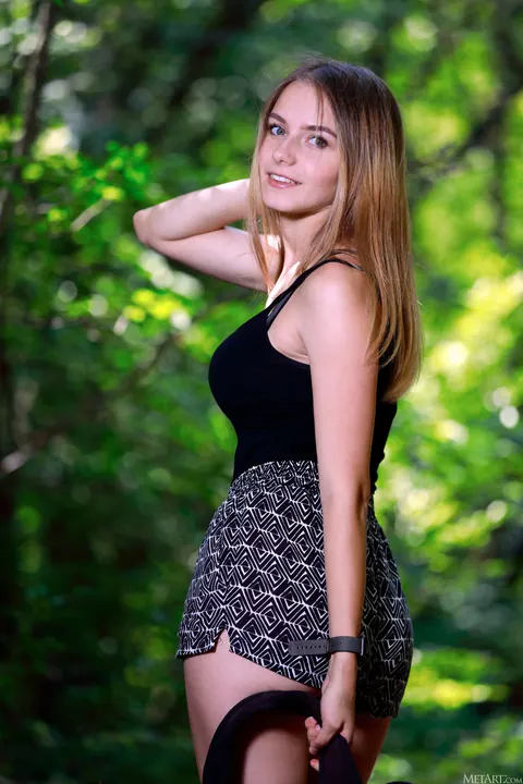 Dakota Pink: Busty Russian Brunette Strips Out of Her Shorts in the Forest – photo 2 of 21