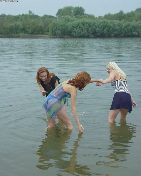 Three Women Peel Off Their Wet Panties by the River – photo 5 of 16