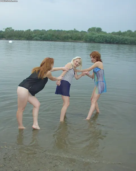 Three Women Peel Off Their Wet Panties by the River – photo 3 of 16