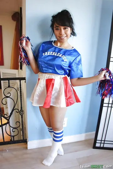 Petite Asian Brunette Flashes Lingerie and Spreads in a Skirt