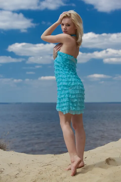 Petite Blonde Strips Out of Her Dress on the Beach – photo 3 of 21