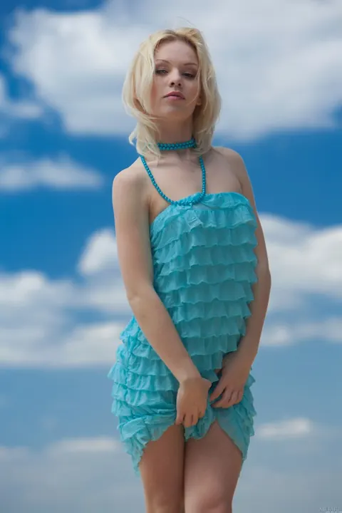 Petite Blonde Strips Out of Her Dress on the Beach – photo 1 of 21